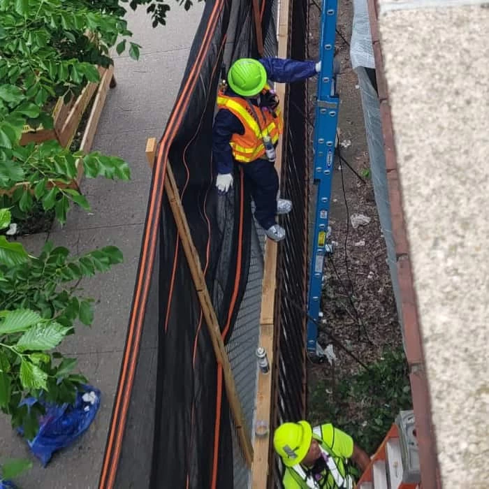 Green Island Group Corp roofing experts installing or repairing roofs in Nassau County, NY