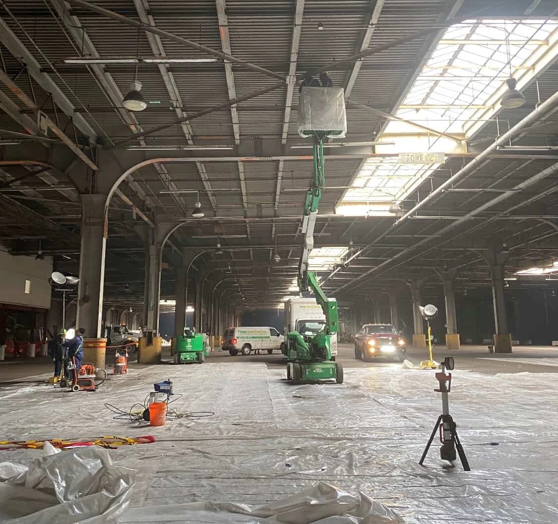 Green Island Group Corp installing or repairing industrial roofing on large commercial facility