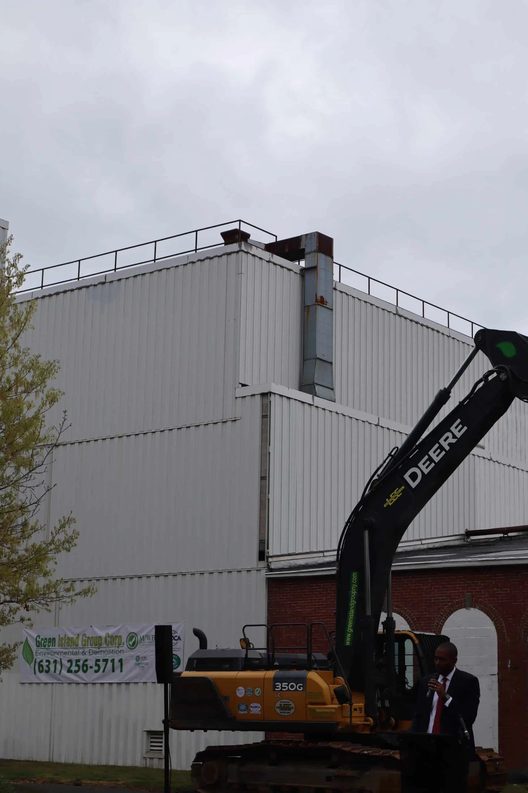 Green Island Group Corp office yard featuring maintained landscaping and professional exterior workspace